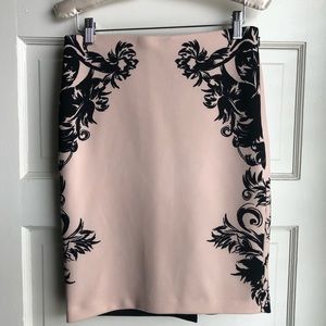 Blush pink and black floral body con skirt